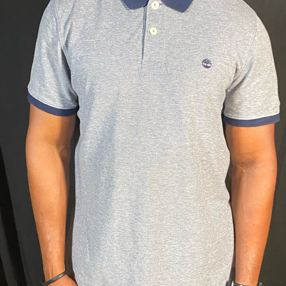 Blue Timberland Polo in a size large.